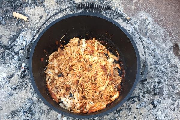 Pulled chicken - all pulled apart inside the dutch oven.